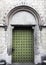 Vintage side entrance in Church of St James the Apostle in Torun