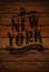 Vintage sign New York. Print on a wooden board. Vector.