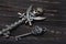 Vintage skull skeleton keys on a wooden table