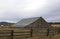 Vintage slope barn and fence in country