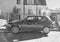 Vintage small compact car Honda Civic 5 Speed parked near old house