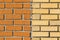 Vintage split color orange yellow brick wall background texture