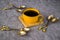 Vintage spoons, silverware, black coffee cup on the table