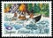 Vintage stamp printed in Finland 1983 show people in the boat