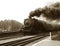 Vintage Steam Engine Locomotive and Train Speeding