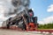 vintage steam train hurtling at speed along the rails, retro vehicle, steam