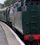 Vintage steam train on the platform at Swanage railway station, Dorset UK.