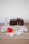 Vintage still life with jewelry box, necklace, perfume and flowers on doily