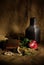 Vintage still life with red rose vase and pearls