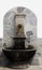 Vintage stone drinking fountain