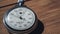 Vintage Stopwatch Lies on Wooden Table and Counts the Seconds, Timelapse