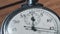 Vintage Stopwatch Lies on Wooden Table and Counts the Seconds, Timelapse