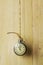 Vintage stopwatch on a wooden background.