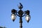 Vintage street lamp post with ship sculpture in London, England