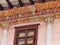 Vintage stucco facade with balcony, Cuenca, Ecuador