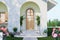 Vintage style arched entrance Surrounded by flower garden 3d render