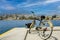 Vintage style bicycle standing on Pier of marina Zeas, opposite of Pasalimani city in Piraeus, Greece