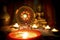 Vintage style image of dreamcatcher and candle light with blurred Buddha statue on the background