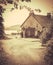 Vintage Style Photo Of Rural Cottage By The Sea