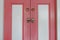 Vintage style pink front door.