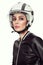 Vintage style portrait of young beautiful woman with stylish make-up in biker helmet