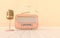 Vintage style radio receiver and microphone. Pastel colors and golden details. Retro radio and mic realistic 3d render. Music