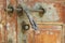 Vintage Style Rustic Brass Door Bolt on Old Wooden Door