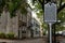 Vintage-style street sign is displayed in a picturesque cobblestone street in Charleston, SC, USA