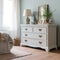 Vintage style white chest of drawers in sunlit classic room, created using generative ai technology