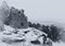 A vintage styled B&W photo an Anasazi ruin.