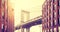 Vintage stylized Manhattan Bridge seen from Dumbo, New York.