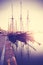 Vintage stylized sailing boats at sunrise.