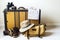 Vintage suitcase, binoculars, old suede shoes, map and old photo camera. Space for text