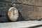 Vintage swiss pocket watch on the wooden boards