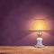 Vintage table lamp on purple background