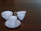 Vintage tea set on mahogany dining table