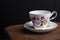 Vintage teacup on a distressed wooden table top