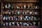 vintage teacups arranged on rustic wooden shelves