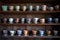 vintage teacups arranged on wooden shelves