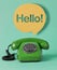 Vintage telephone with Hello speech bubble