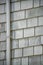 Vintage texture and building pattern with brown timber wood tiles and gray rain gutter pipe on side of house or home