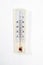Vintage thermometer for measuring temperature on wooden white table