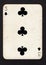 A vintage three of clubs playing card on a black background.