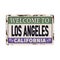 Vintage tin sign. Los Angeles. Retro souvenirs or old postcard templates on rust background.