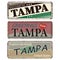 Vintage tin sign set Tampa. Retro souvenirs or old postcard templates on rust background.