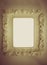 Vintage tone background of old cream picture frame with blank sp