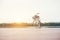 Vintage toned of bicycle with basket on empty pier, summer day.