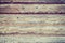 Vintage toned close up of a mountain cabin wooden wall.