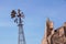 Vintage toned photo of an old western windmill tower, American wild west symbol .