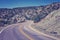 Vintage toned scenic curved road, travel concept background, Col